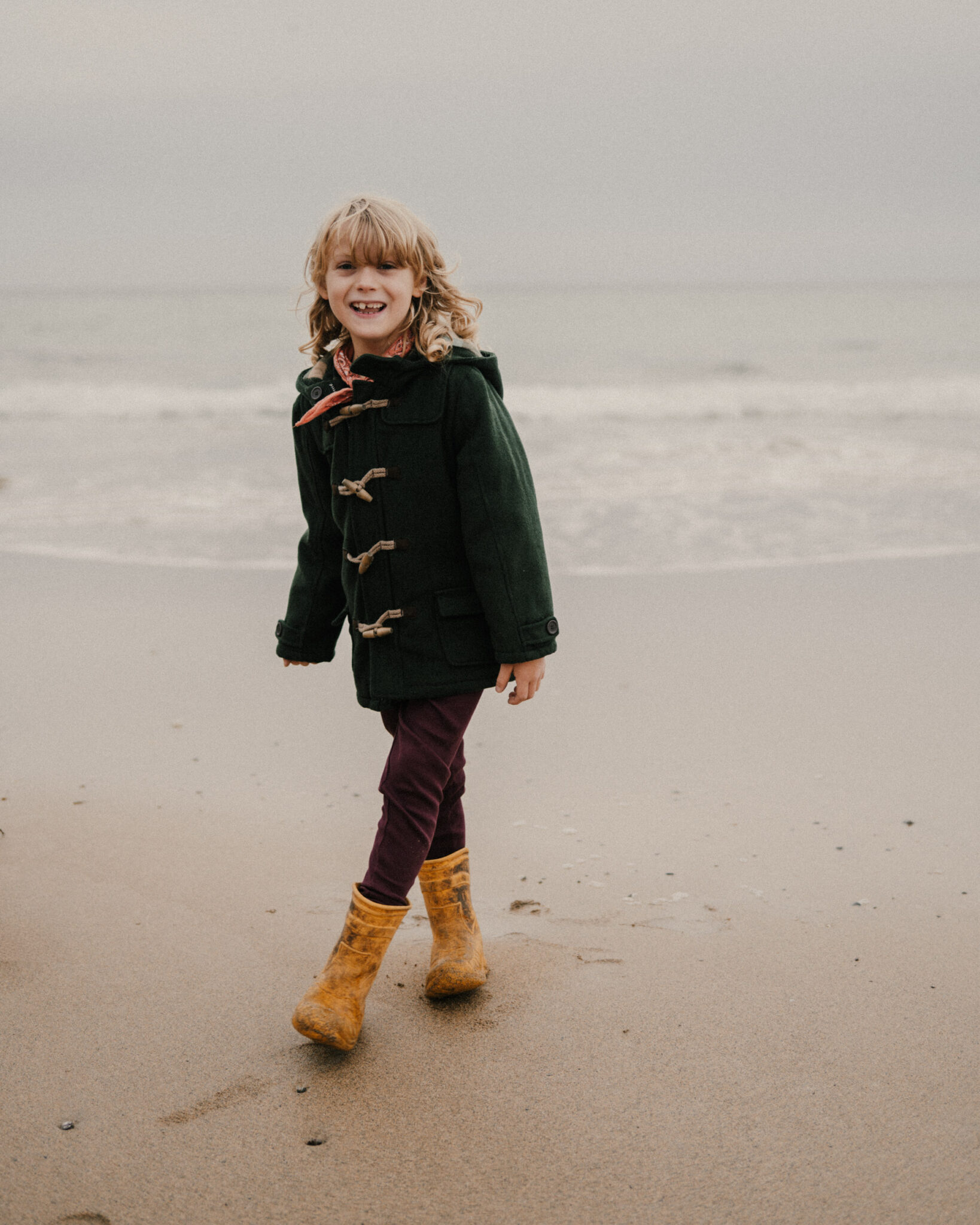 Photo of child on beach in Cornwall