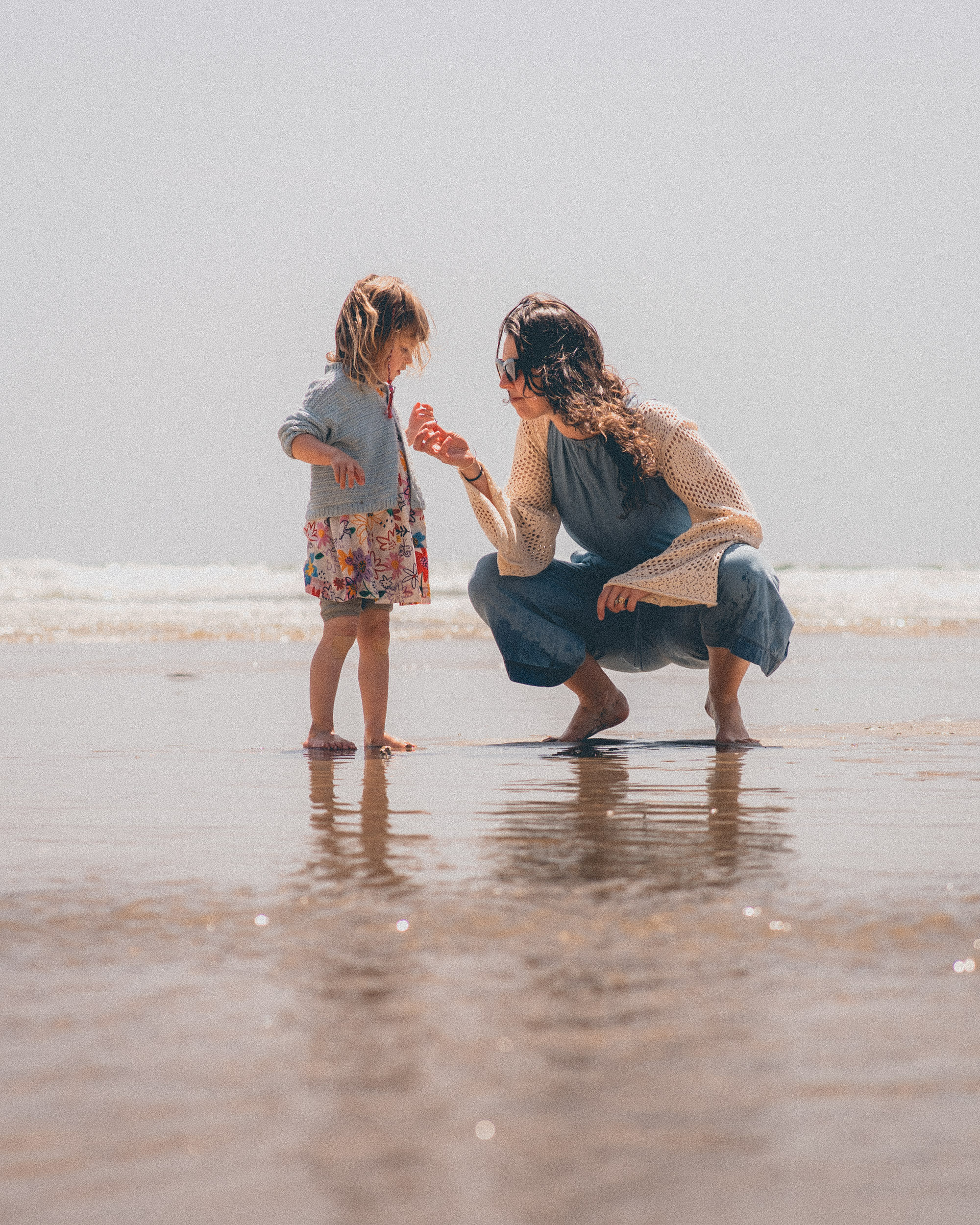 Picture of mother and child at maenporth beach Cornwall