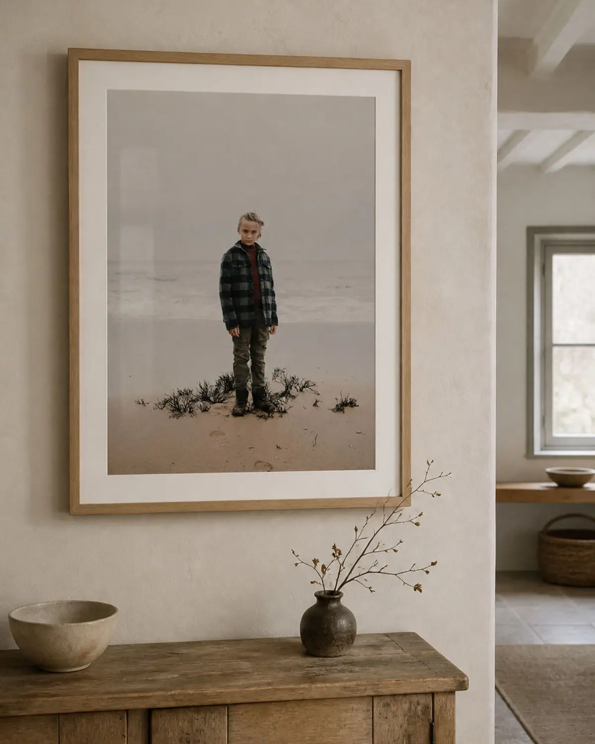 Framed portrait of a child displayed in a family home
