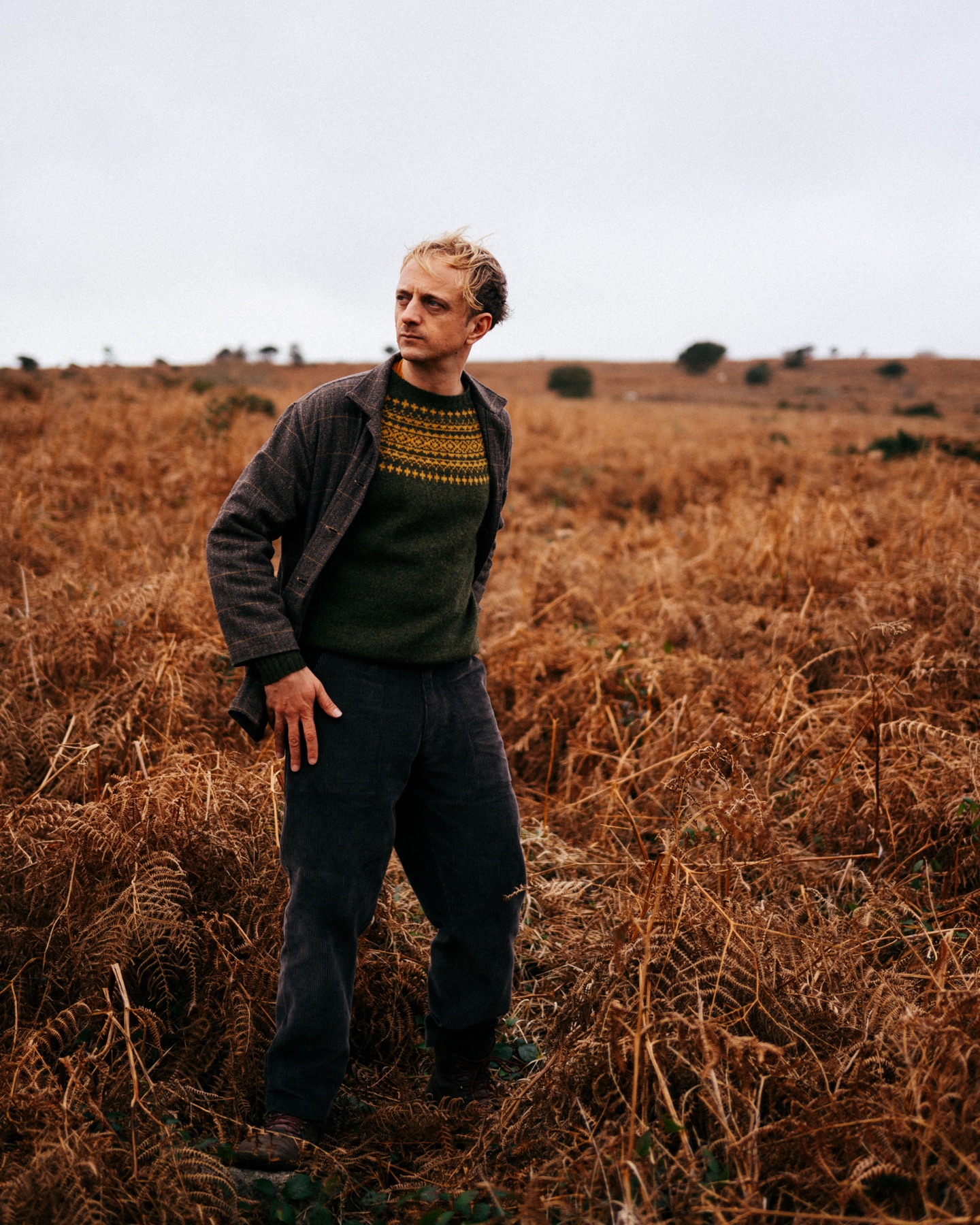 Danny standing among the bracken at Godolphin House